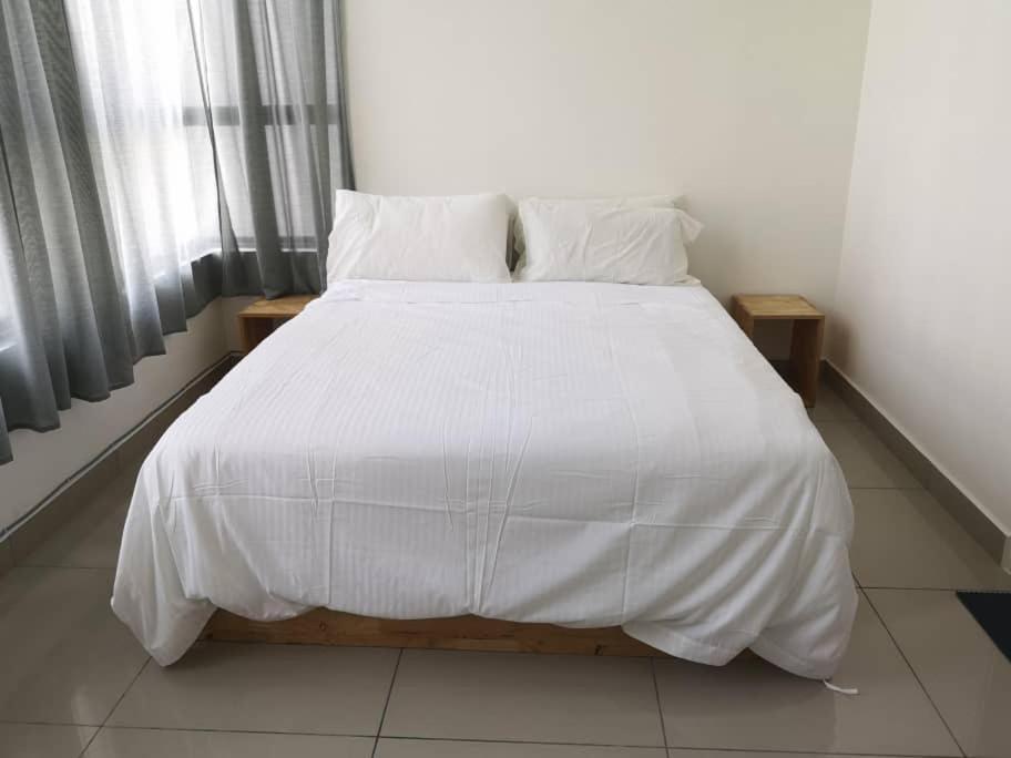 Aiyu Homestay, Conezion, Ioi Resort Putrajaya Extérieur photo